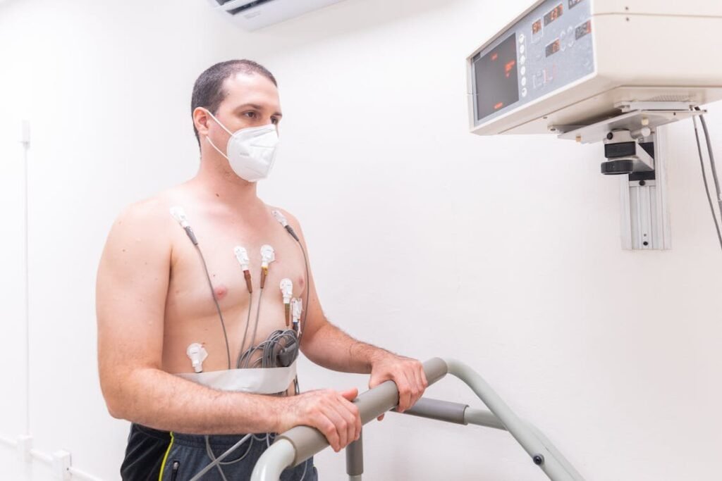 Who Should Undergo Heart Screening? Patient undergoing a cardiac stress test with ECG monitoring to assess heart health and detect potential cardiovascular conditions.